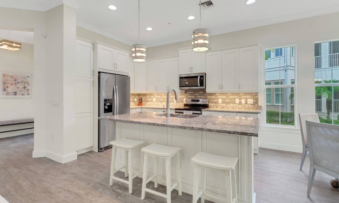 Isles of Collier Preserve Apartment | 30-day minimum lease | Isles of Collier | 3 bedrooms | 3 bathrooms | a den/office | sunroom | 2-car garage.