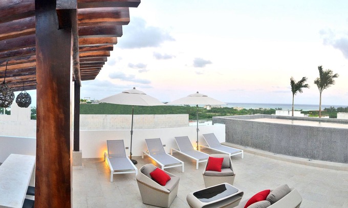 Luis Donaldo Colosio Apartment | 303 Beautiful apart meters away from the sea with a rooftop pool pet friendly!