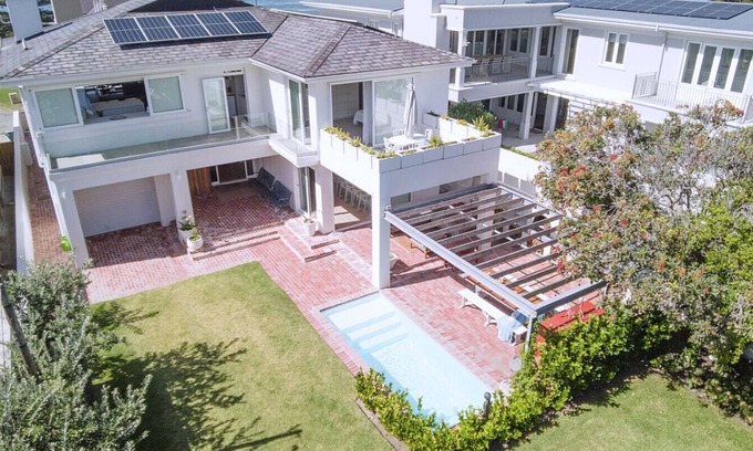 Hermanus Villa | 34 Mossel River 12 — Elegant Coastal Retreat | Ocean Views | Poolside Luxury