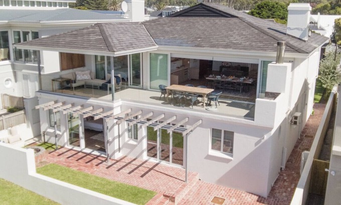 Kwaaiwater Villa | 34 Mossel River 8 — Elegant Coastal Retreat |Ocean Views | Poolside Luxury