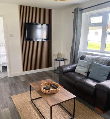 Scurlage House | 37 Gower holiday village Ty Seren Cosy 2 bedroom chalet with a seasonal pool