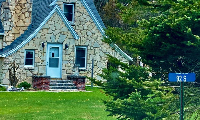 Manistique Cottage | 3BR/1.5BA Woodsy Stone Cottage 1 Hr to Pictured Rocks, Hike Trails On-Property