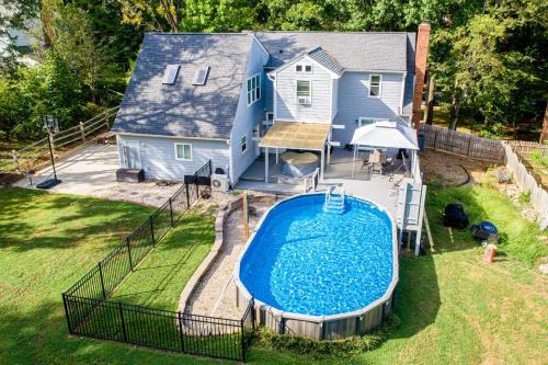 McAlpine House | 3BR Charlotte Escape Pool Hot Tub Theater