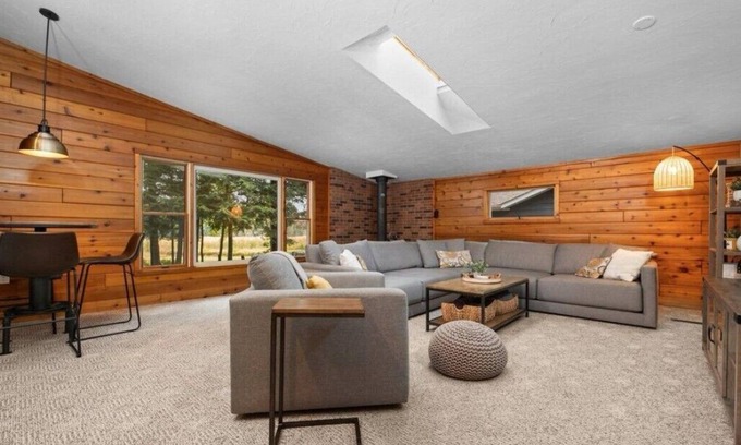 Rapid City Cabin | 4-bedroom Cabin on the Rapid River with WiFi, AC, Dock, Access to Chain of Lakes