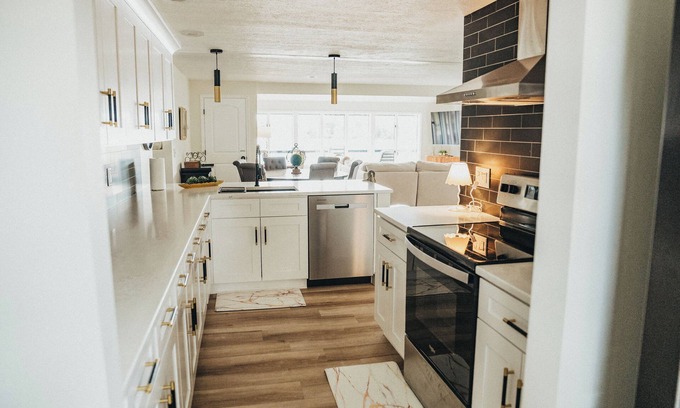 Portage Lakes Cottage | 4-bedroom cottage in peaceful Portage Lakes w/hottub, lake access, pet friendly