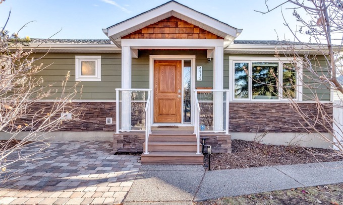 Southwest Calgary House | 4-bedroom detached home with recreation room and hot tub!