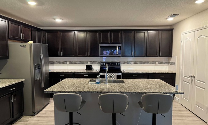 Meadow Woods House | 4 bedroom House close to all Orlando Parks
