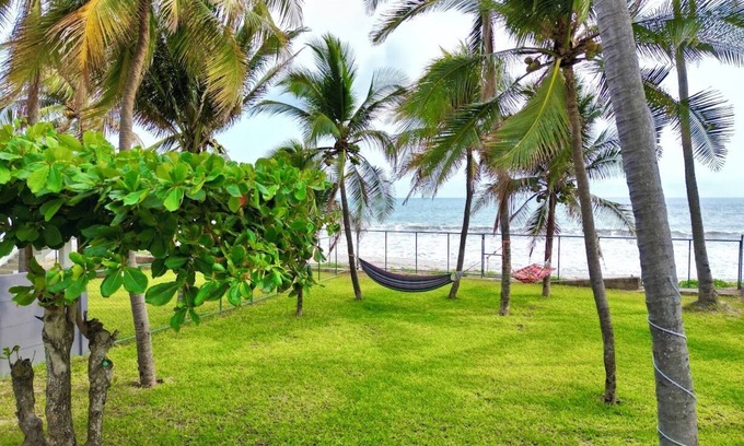 San Luis Talpa House | 4-bedroom house in Amatecampo with AC, WiFi. Enjoy a peaceful getaway