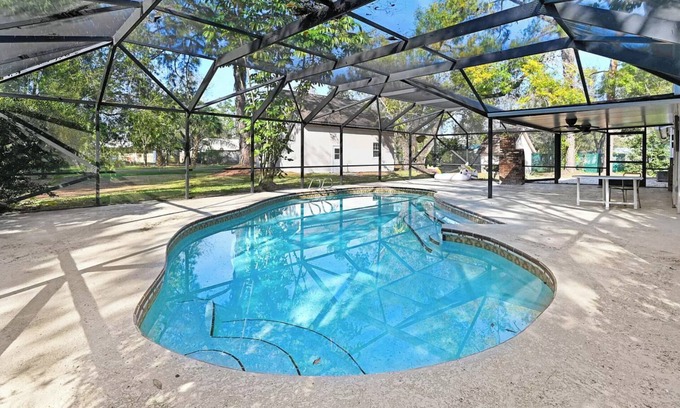 West Melbourne House | 4 Bedroom Pool Home on large acre lot.