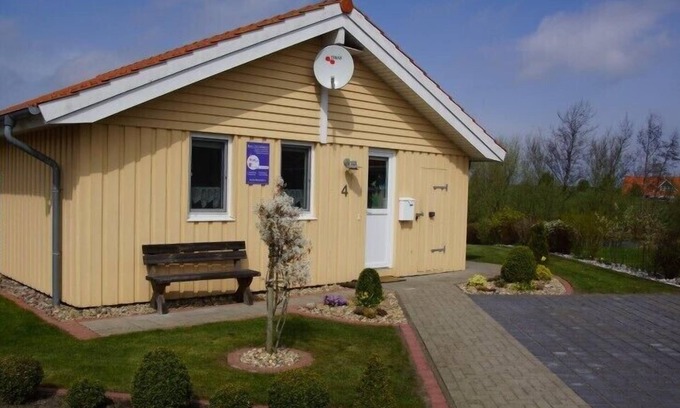 Norderteil House | 4 person vacation home with private jetty, direct lakeside location, canoe and sauna in Otterndorf