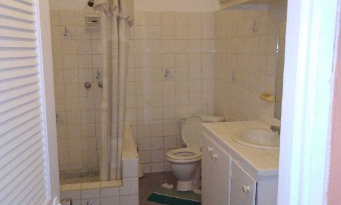 Bois d'Orange Condo | 4 separate single bedrooms,bathrooms,living and kitchen.beach access