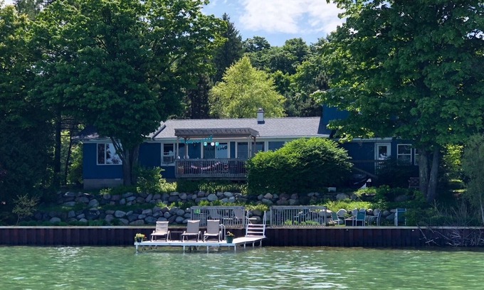 Suttons Bay Cottage | 4BDR/3BTH waterfront home, dock, firepit, sunsets & in the heart of winecountry