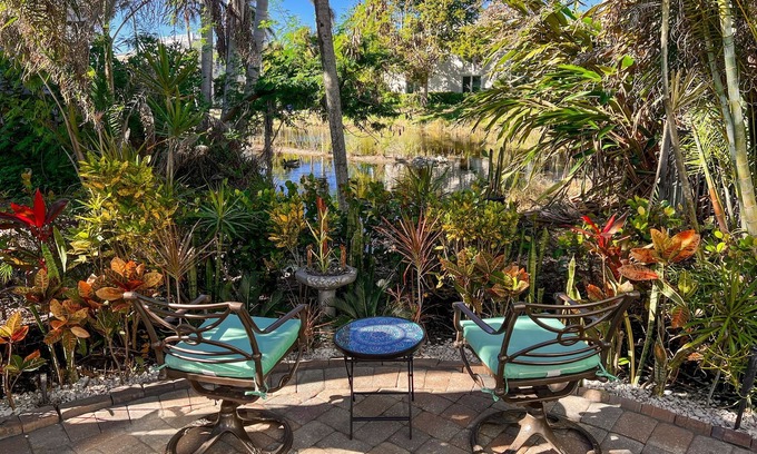 Old Naples Condo | 5-8 MINUTE WALK TO BEACHES, DINING & SHOPPING! RARE PRIVATE PATIO & LAKE VIEW!