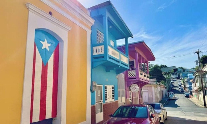 Mayaguez Pueblo Apartment | 5.9 Purple Casita w/historic balcony