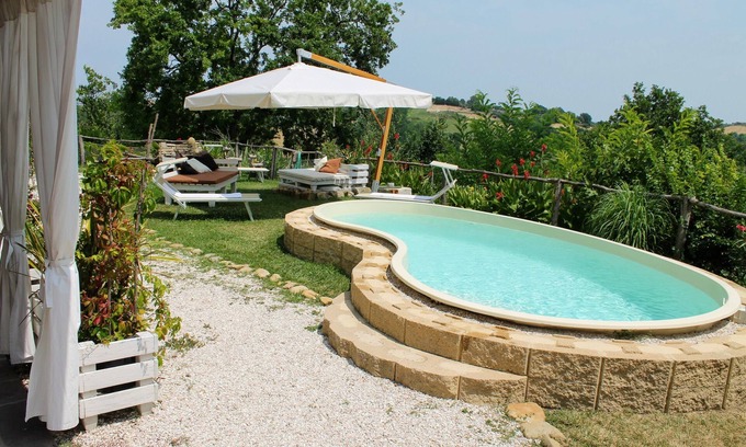 Monteciccardo Apartment | 5-bedroom holiday apartment: nature, swimming pool, relax 30 mins from the beach