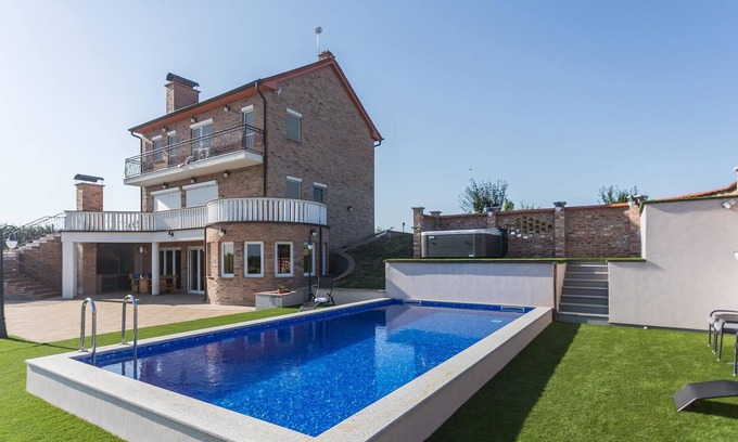 Svajcarnica House | 5 bedroom lake front home in Ceminac