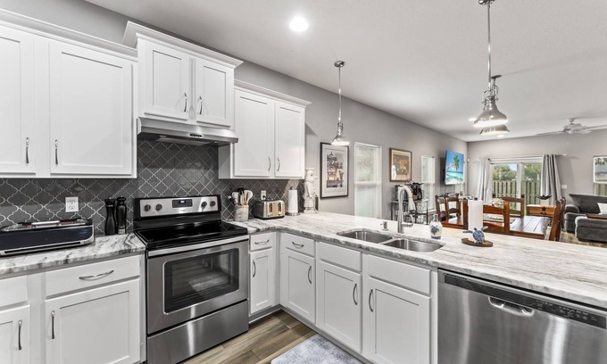 Jacksonville Beach House | 5 min crawl to beach! 4 br 2.5 ba large townhome. Shuffleboard! Mayo Clinic near