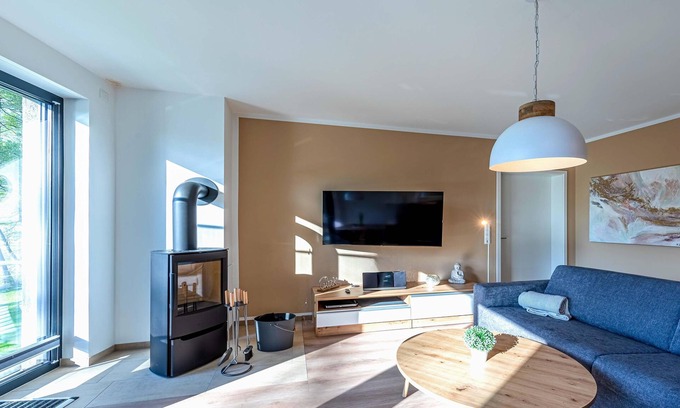 Krakow am See Apartment | 5-star vacation apartment Sonnengruß with a side view of Lake Krakow