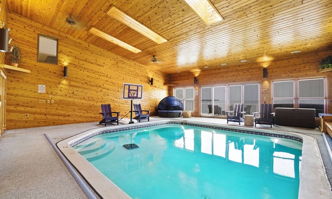 Prudenville House | 6BR Houghton Lake House w/Indoor Pool, Hot Tub, and Golf Simulator - Sleeps 24