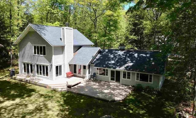 Idylwilde House | 8 Bedroom Dream Home in Harbor Springs with water views and a beach!