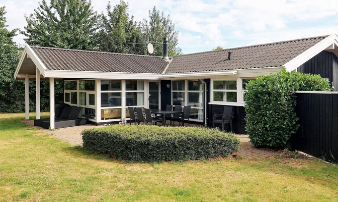 Hasmark Strand House | 8 person holiday home in Otterup