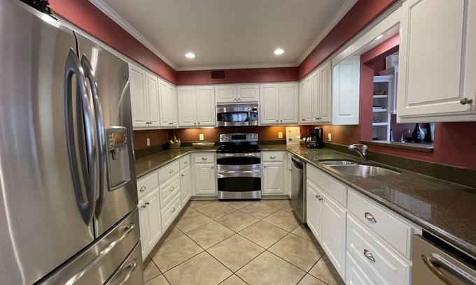 Mount Ida Condo | 80BPD, Four bedroom, two 1/2 bath log-sided condo with lake view , garage by RedAwning