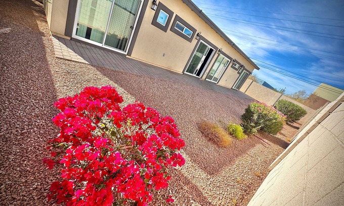 Estrella Village House | 9-Bedroom 7 bath Phoenix home with Modern Amenities & Patio Access & Events