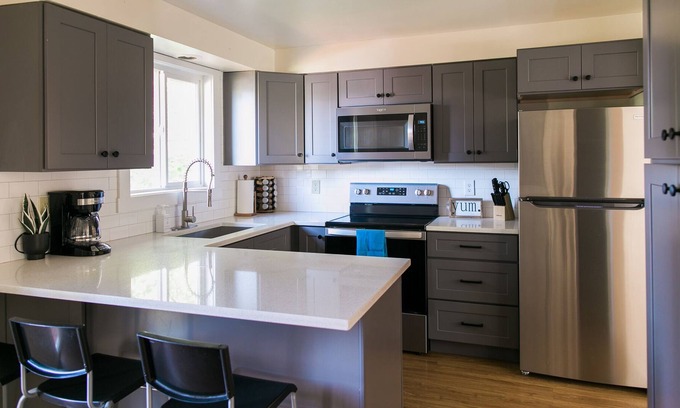 Spokane Valley House | 9 beds! Sleeps 16! 6 bedrooms, 4 bathrooms, 2 kitchens… rent a whole duplex!