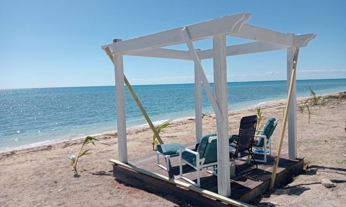 Coral Harbour Apartment | A beautiful apartment on a oceanfront property directly on coral harbour beach.
