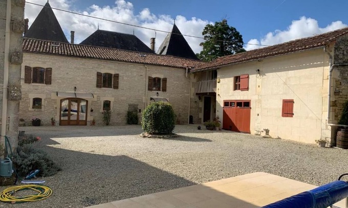Aujac House | A beautiful, twin towered, Charente-Maritime house