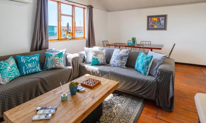 Hornby Apartment | A comfy family stay near Hornby Mall Sleeps 8