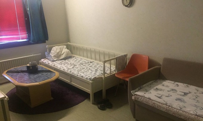 Lantinen District Apartment | A cozy room in kannelmaki
