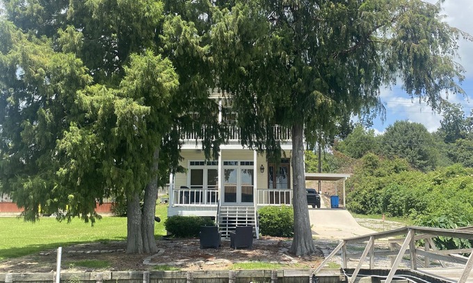 New Roads House | A fishing and swimming paradise . PARTY BARGES AVAILABLE ON REQUEST