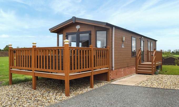 Stonham Aspal Cottage | A lovely bright lodge next to a field on a great site for people of all ages.