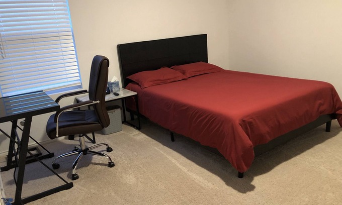 Princeton Condo | A master bedroom suite with its own bathroom and kitchen