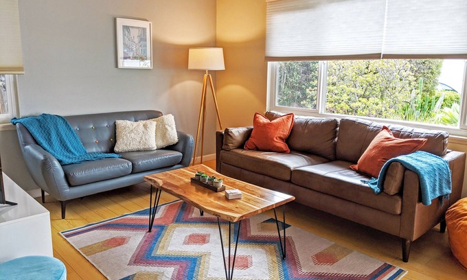 Bay Ho House | A mid-century hidden gem! Modern duplex with big yard close to beaches.