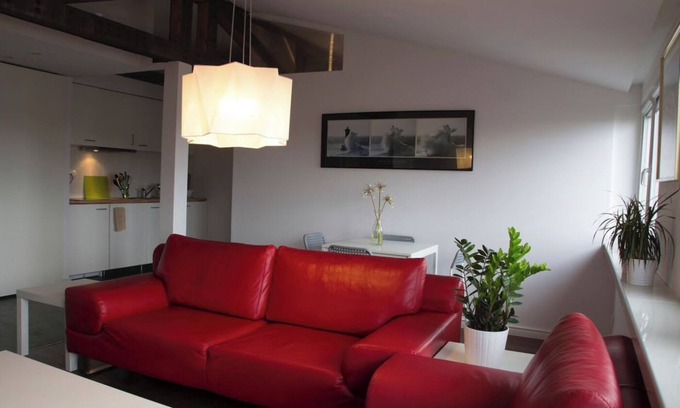Mokotow Condo | A modern city apartment with good views.
