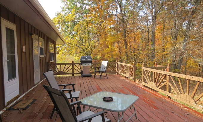 Miramiguoa Park House | A nice view of the woods awaits you from the countryside kitchen window and deck