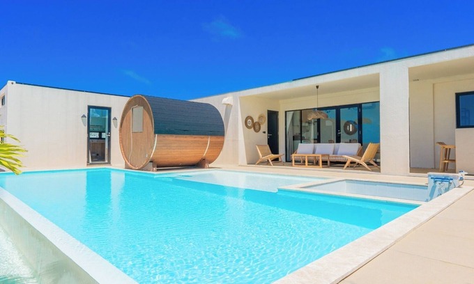 Miyakojima House | A private villa with a pool jacuzzi and sauna overlooking the ocean from a high vantage point/Miyakojima Okinawa