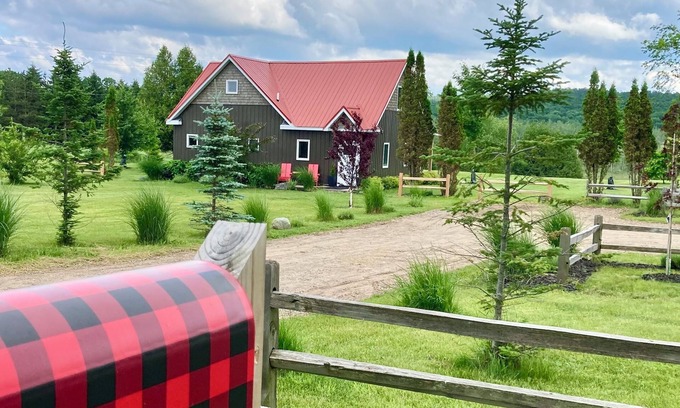 Boyne Falls House | A River Runs Through It! Charming 2-bedroom home near Walloon Lake