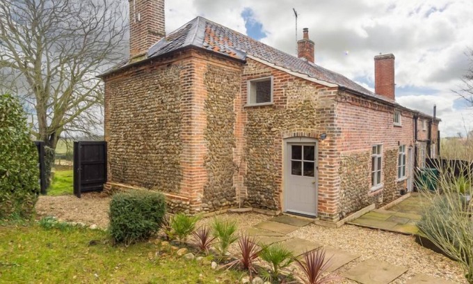 Fakenham Cottage | A romantic fairytale luxury cottage for four in South Raynham.