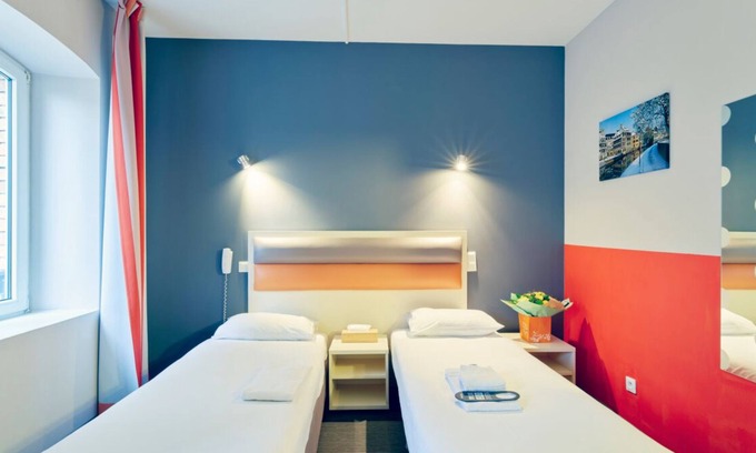 Contades Hotel | A short drive to Rohrschollen Nature Reserve! Close to Place du Marché Gayot!