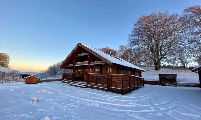 Gorebridge Cabin | A traditional Scandinavian style lodge, with stylish wooden interior decorated with a Scottish theme