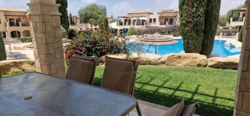 Aphrodite Hills Apartment | AA02 Adjacent to Aphrodite Hills- Communal Pool, Garden