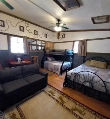 Canton House | Acorn Hideaways Canton Old West Bunkhouse for 9 - Trail's End Corral