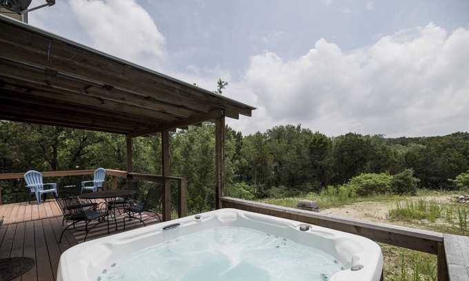 Wimberley Cabin | Adorable country cottage overlooking a wet weather creek with hot tub