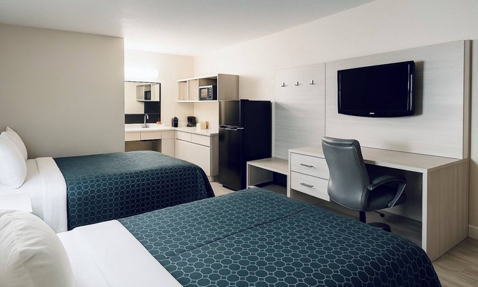 Griffin Apartment | Affordable hotel suites with WiFi, AC in charming McDonough
