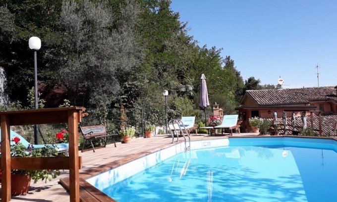 Sarnano House | Affordable villa with private semi-sunken pool and garden near Sarnano