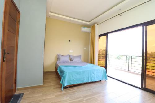 Kribi Apartment | AfriqPnB Chambre Ewondo avec Piscine