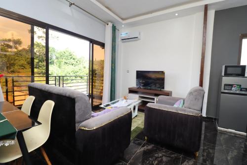 Kribi Apartment | AfriqPnB RF2 Studio Emombo avec Piscine